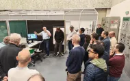 Uczestnicy spotkania DERlab podczas wizyty studyjnej w laboratorium badawczym,